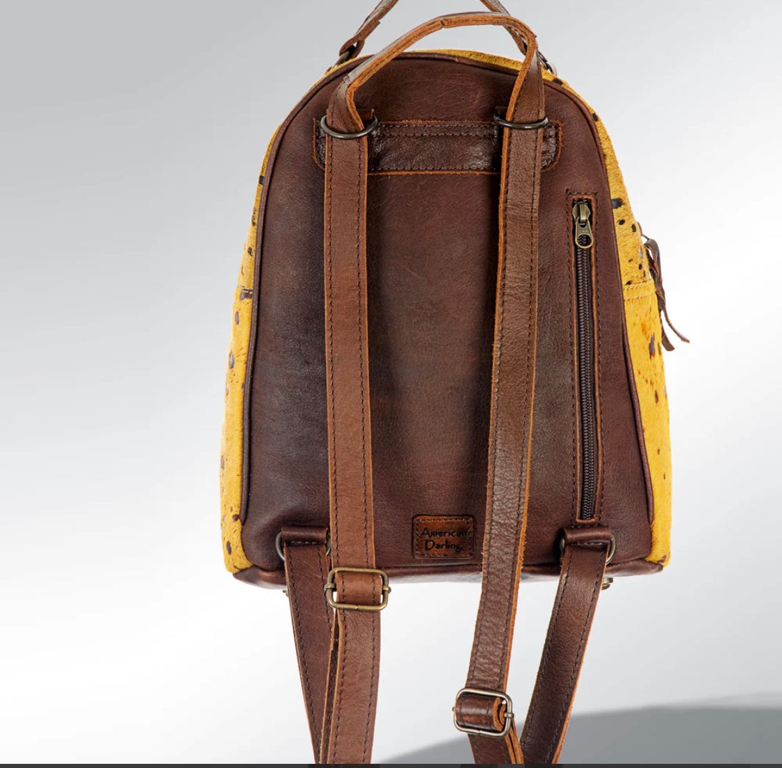 Yellow cowhide leather backpack
